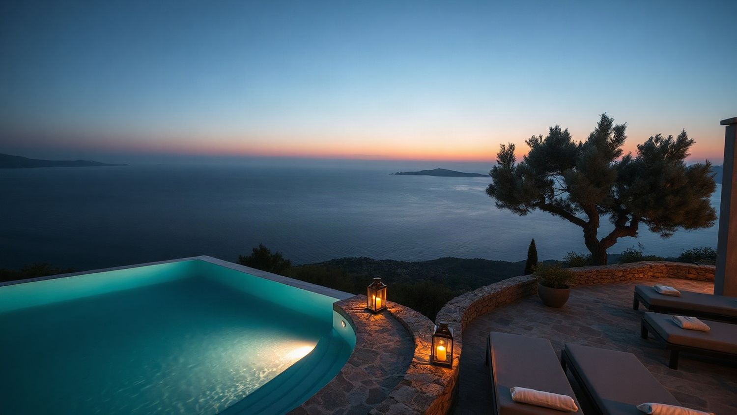 A villa terrace above the sea at dusk
